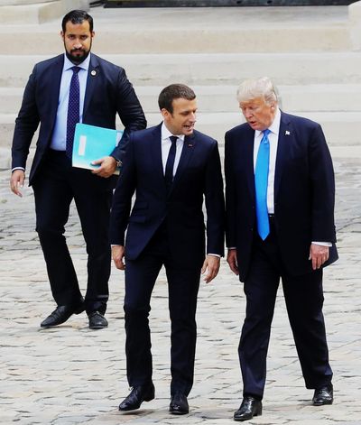 Alexandre Benalla walking alongside President Donald Trump and President Emmanuel Macron at Les Invalides, Paris, July 2017